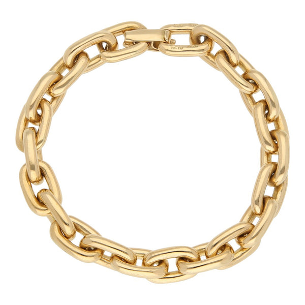 Pulsera eslabón cruzado firma Tane en oro amarillo 18 kilates.
