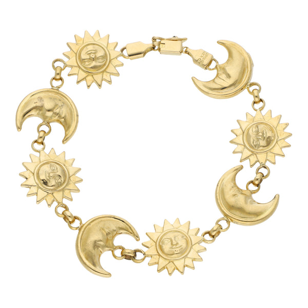 Pulsera eslabón cruzado con aplicaciones sol y luna en oro amarillo 18 kilates.