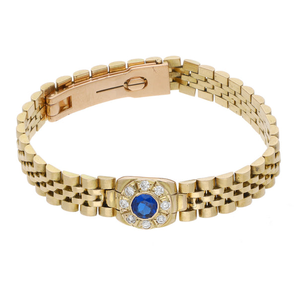 Pulsera eslabón articulado con sintéticos en oro dos tonos 14 kilates.