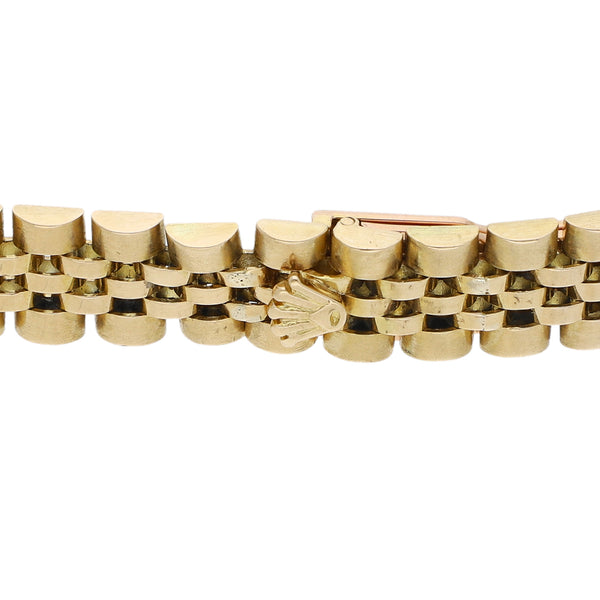 Pulsera eslabón articulado con sintéticos en oro dos tonos 14 kilates.