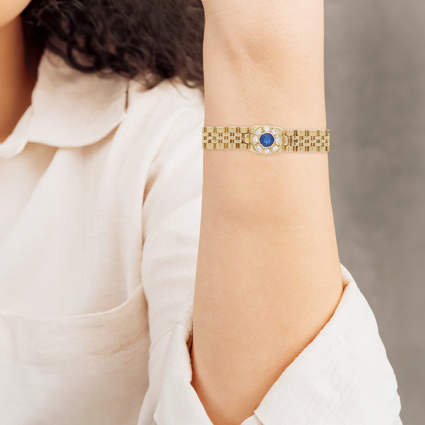 Pulsera eslabón articulado con sintéticos en oro dos tonos 14 kilates.