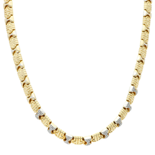 Gargantilla eslabón articulado con diamantes en oro amarillo 14 kilates.