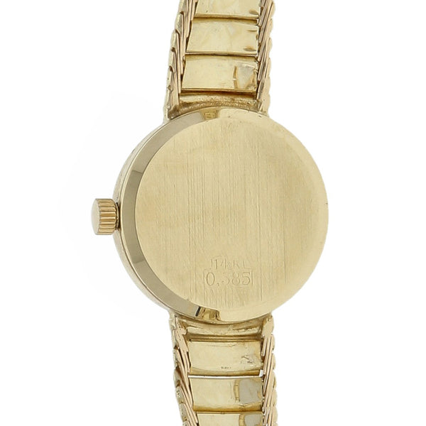 Reloj Vicence para dama en oro amarillo 14 kilates.