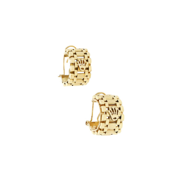 Aretes diseño especial en oro amarillo 14 kilates.