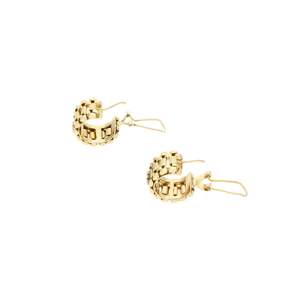 Aretes diseño especial en oro amarillo 14 kilates.