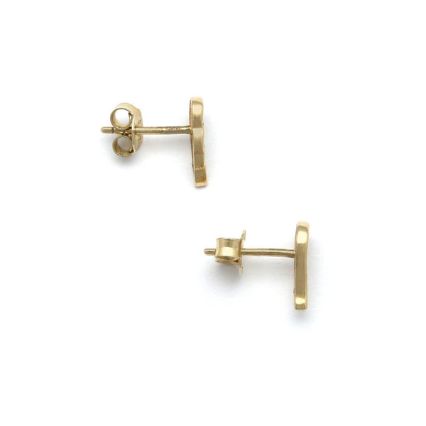 Aretes diseño especial motivo alas con circonias en oro amarillo 14 kilates.