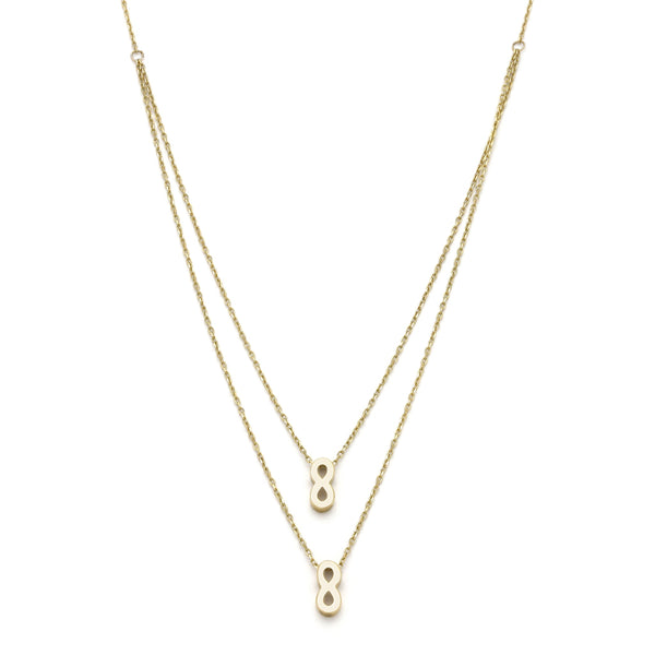Gargantilla de dos hilos eslabón cruzado con colgantes motivo infinito en oro amarillo 14 kilates.