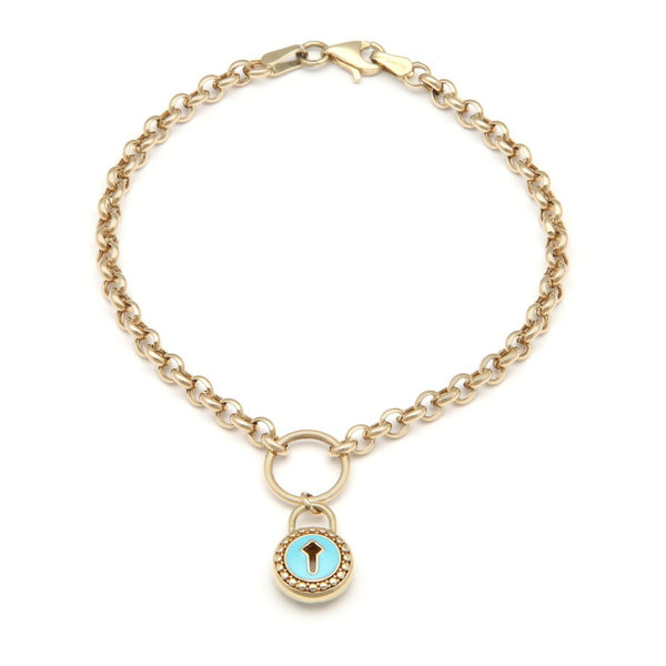 Pulsera eslabón cruzado con colgante motivo candado y esmalte en oro amarillo 14 kilates.