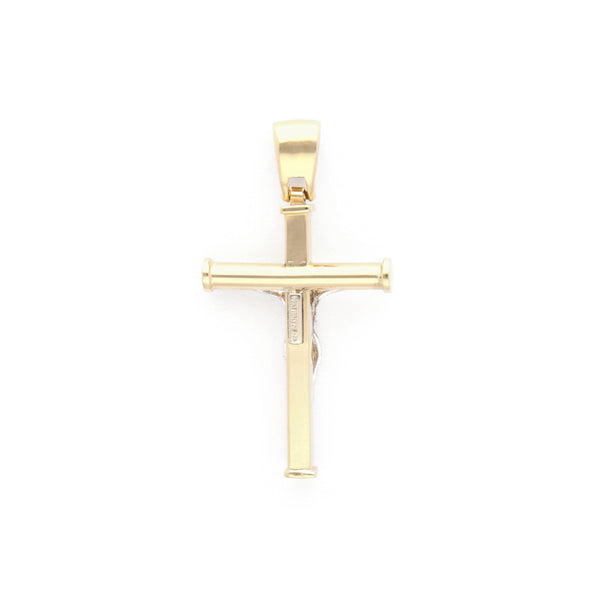 Crucifijo liso en oro dos tonos 14 kilates.