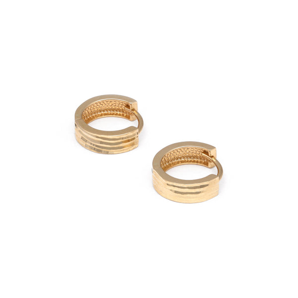 Arracadas articuladas en oro amarillo 14 kilates.