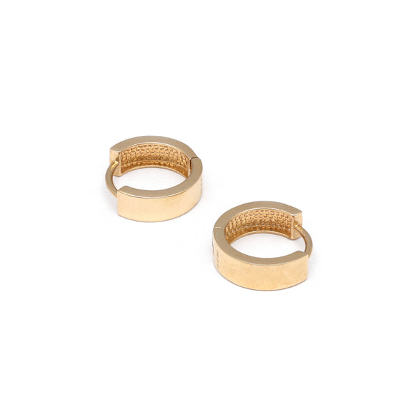 Arracadas articuladas en oro amarillo 14 kilates.