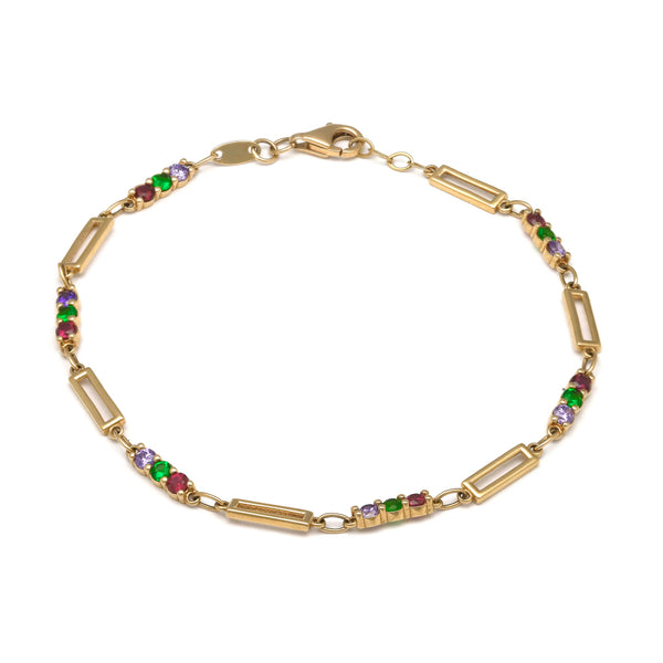 Pulsera eslabón combinado con aplicaciones y sintéticos en oro amarillo 14 kilates.