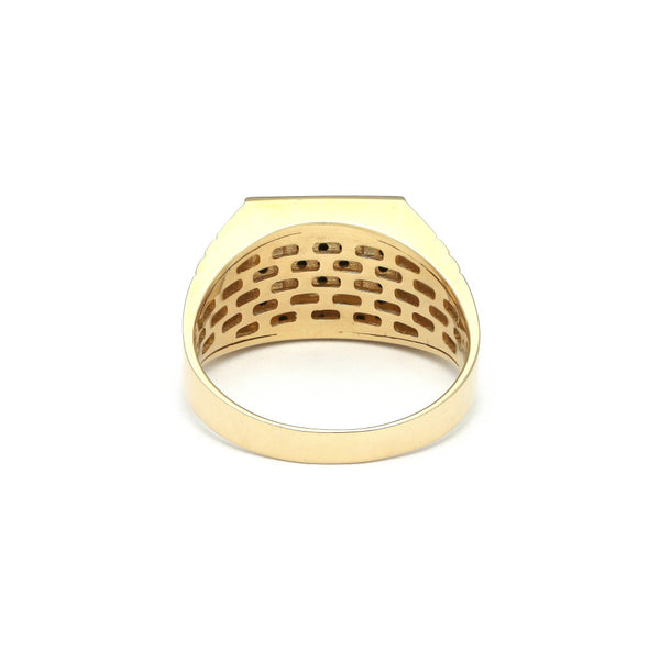 Anillo tipo sello con circonias en oro amarillo 14 kilates.