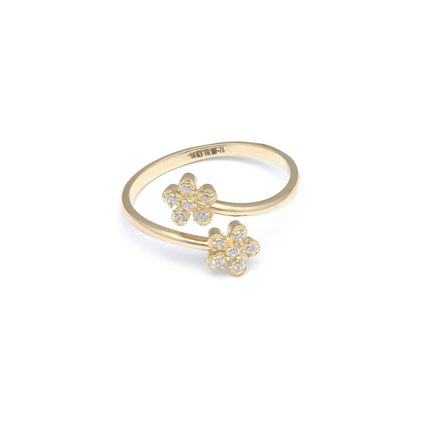 Anillo abierto motivo flores con circonias en oro amarillo 14 kilates.