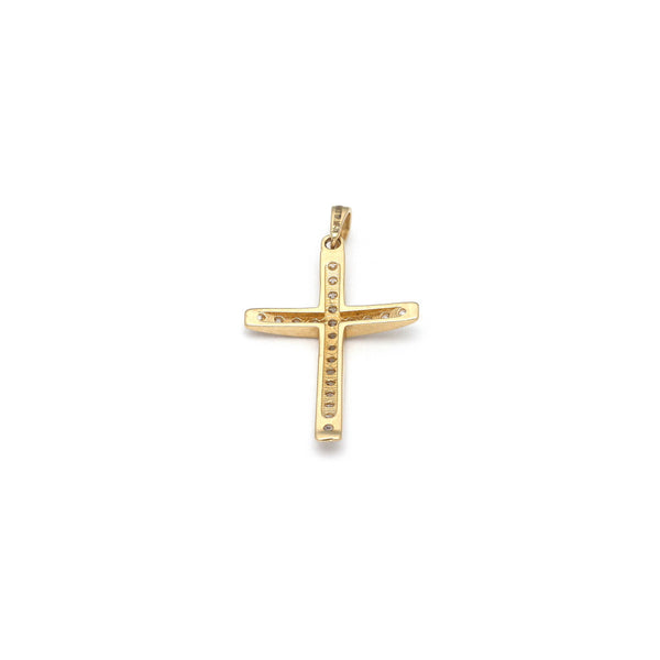 Cruz diseño especial con circonia en oro amarillo 14 kilates.