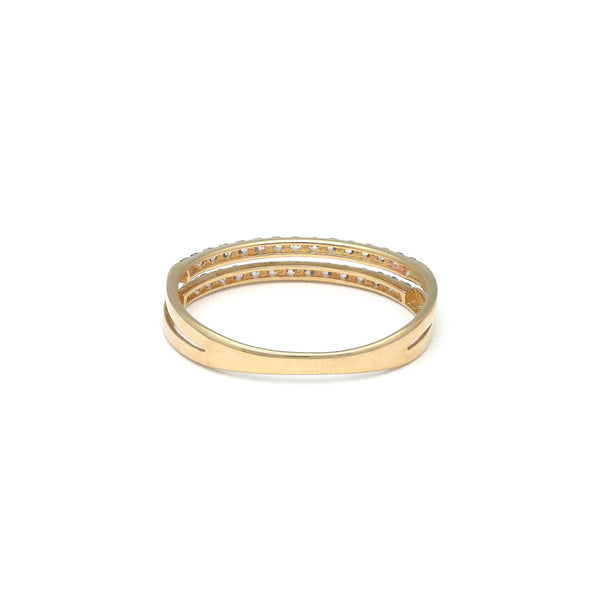 Anillo calado con circonias en oro amarillo 14 kilates.