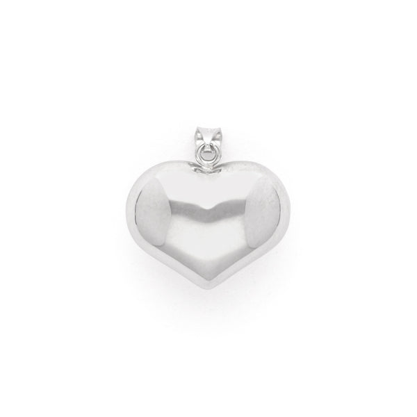 Dije hueco motivo corazón en oro blanco 14 kilates.