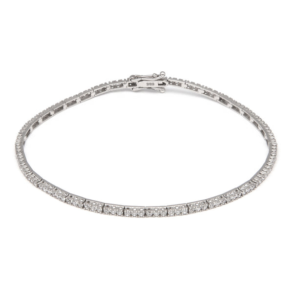 Pulsera eslabón articulado con circonias en oro blanco 14 kilates.