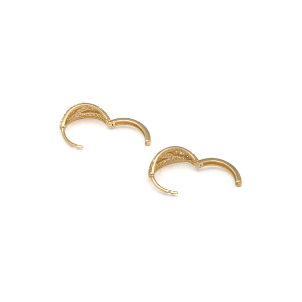Arracadas articuladas motivo grecas con circonias en oro amarillo 14 kilates.