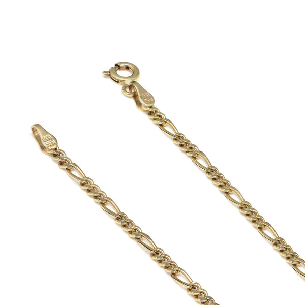 Pulsera de tres eslabones por uno en oro amarillo 14 kilates.