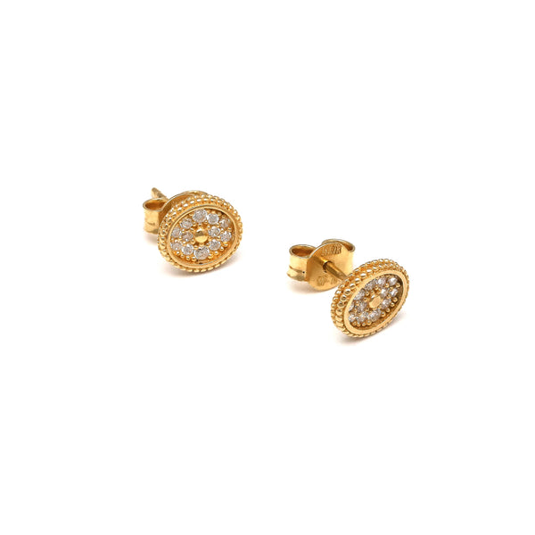 Aretes diseño especial con circonias en oro amarillo 14 kilates.