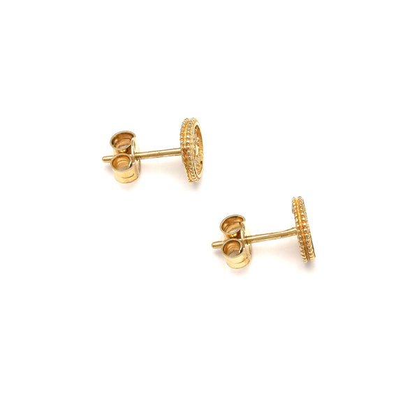 Aretes diseño especial con circonias en oro amarillo 14 kilates.