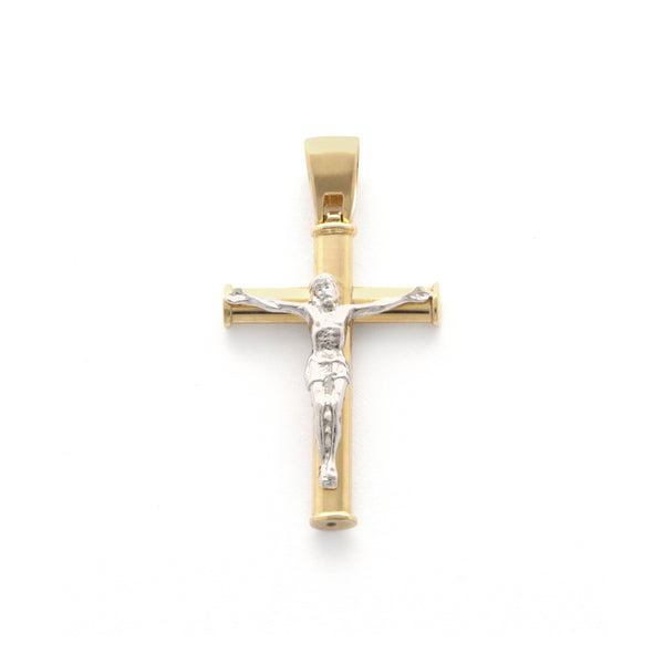 Crucifijo tubular en oro dos tonos 14 kilates.