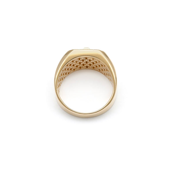 Anillo tipo sello motivo crucifijo con circonias en oro amarillo 14 kilates.