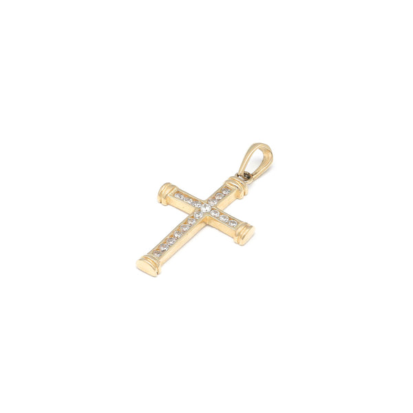 Cruz diseño especial con circonia en oro amarillo 14 kilates.
