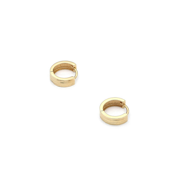 Arracadas articuladas en oro amarillo 14 kilates.