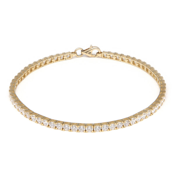 Pulsera eslabón articulado con circonias en oro amarillo 14 kilates.