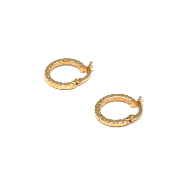 Arracadas facetadas en oro amarillo 14 kilates.