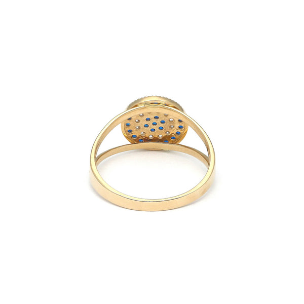 Anillo diseño especial con sintéticos en oro amarillo 14 kilates.