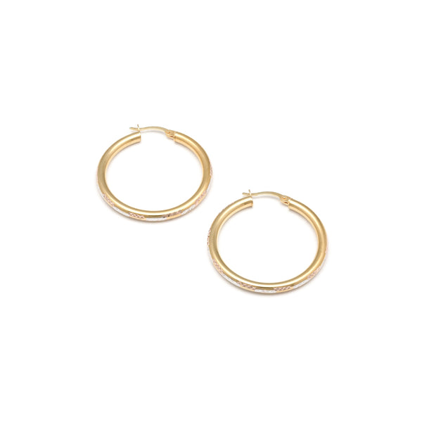 Arracadas facetadas en oro amarillo 14 kilates.