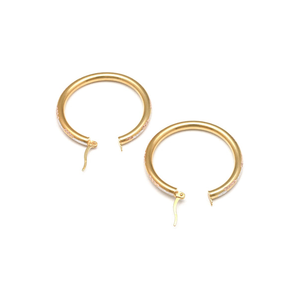 Arracadas facetadas en oro amarillo 14 kilates.