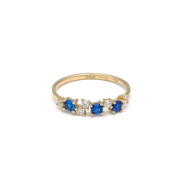 Anillo diseño especial con sintéticos en oro amarillo 14 kilates.