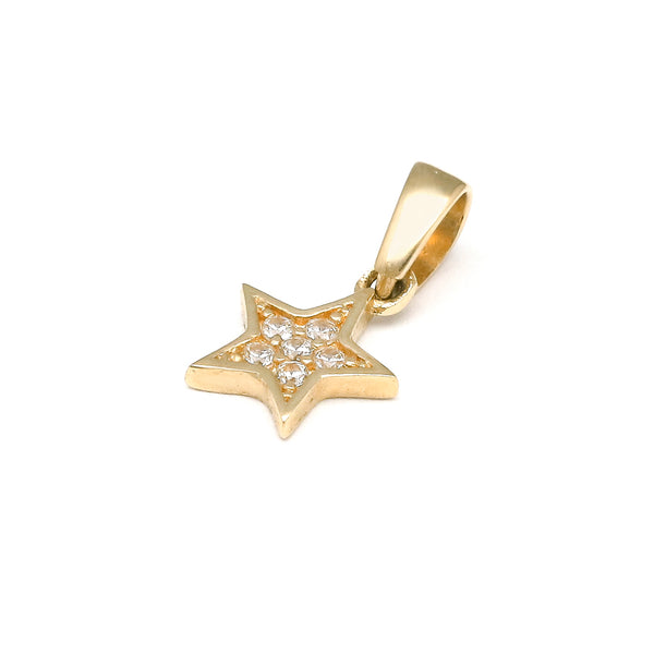 Dije diseño especial motivo estrella con circonias en oro amarillo 14 kilates.