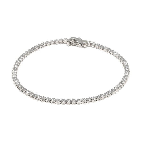 Pulsera eslabón articulado con circonias en oro blanco 14 kilates.