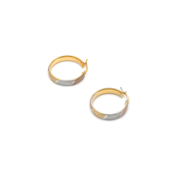 Arracadas huecas en oro amarillo 14 kilates.