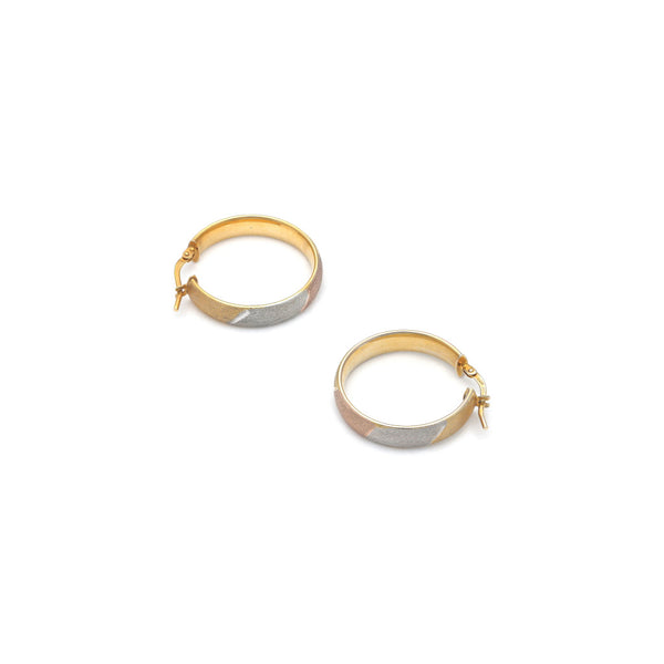 Arracadas huecas en oro amarillo 14 kilates.
