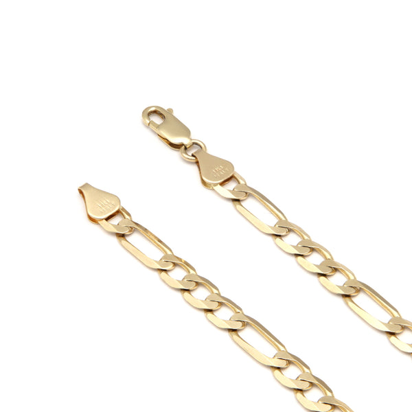 Pulsera de tres eslabones por uno en oro amarillo 14 kilates.