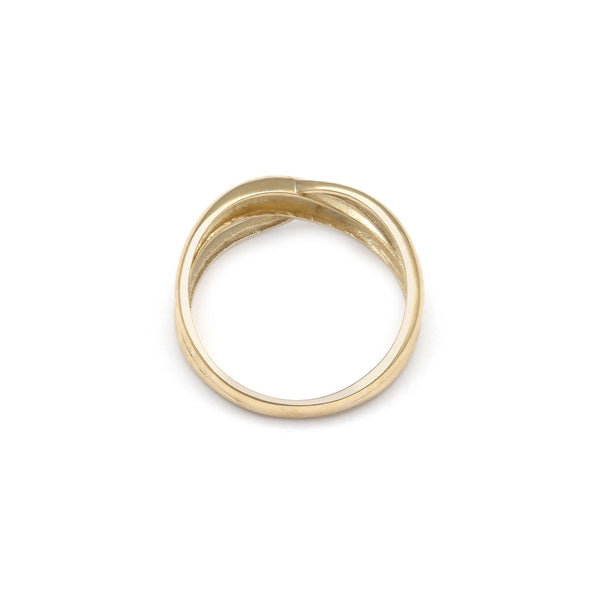 Anillo ondulado en oro amarillo 14 kilates.