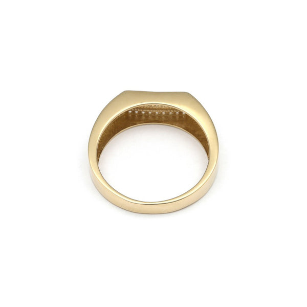 Anillo tipo sello con circonias en oro amarillo 14 kilates.