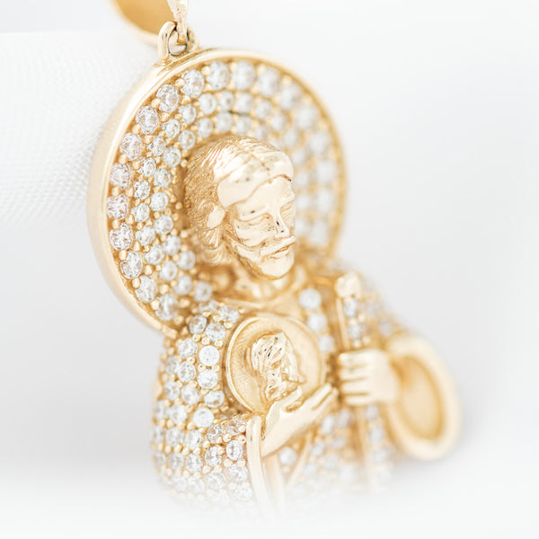 Medalla diseño especial motivo San Judas Tadeo con circonias en oro amarillo 14 kilates.