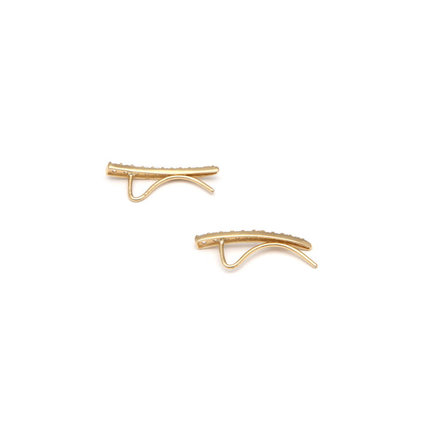 Aretes diseño especial con circonias en oro amarillo 14 kilates.