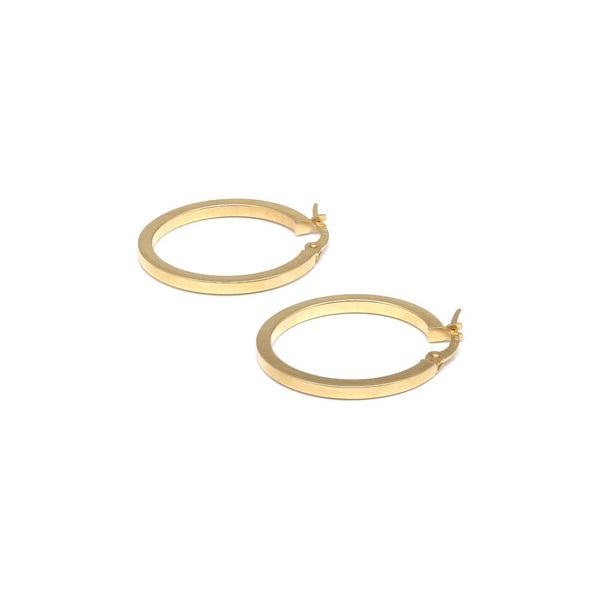 Arracadas lisas en oro amarillo 14 kilates.