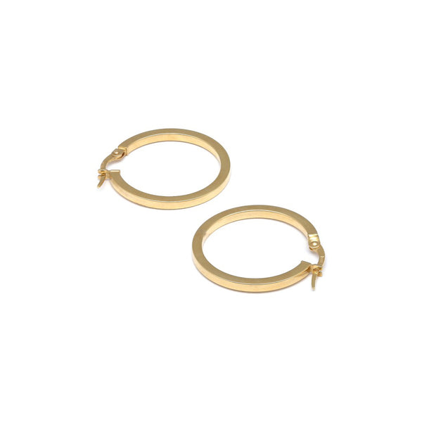 Arracadas lisas en oro amarillo 14 kilates.
