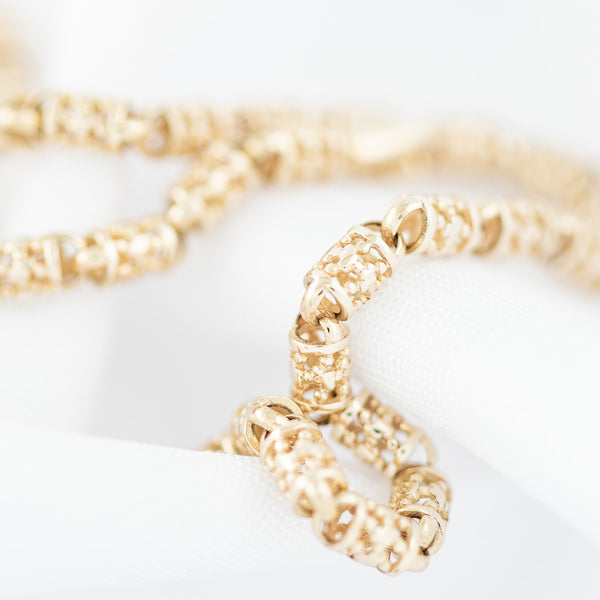 Pulsera eslabón articulado en oro amarillo 14 kilates.