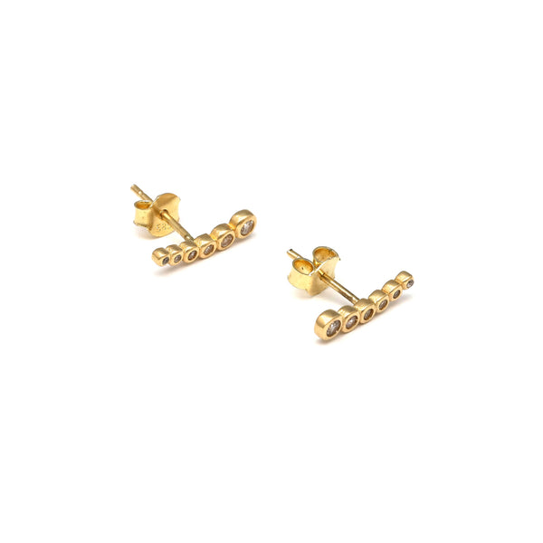 Aretes diseño especial con circonias en oro amarillo 14 kilates.