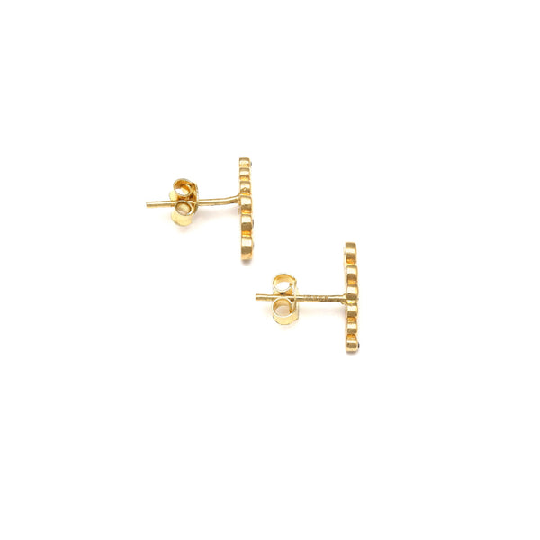 Aretes diseño especial con circonias en oro amarillo 14 kilates.
